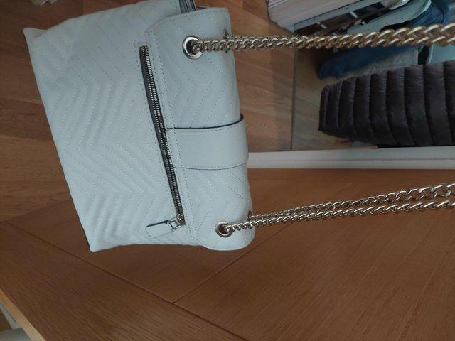 Preview of the first image of Guess Besutil white shoulder bag hardly used.