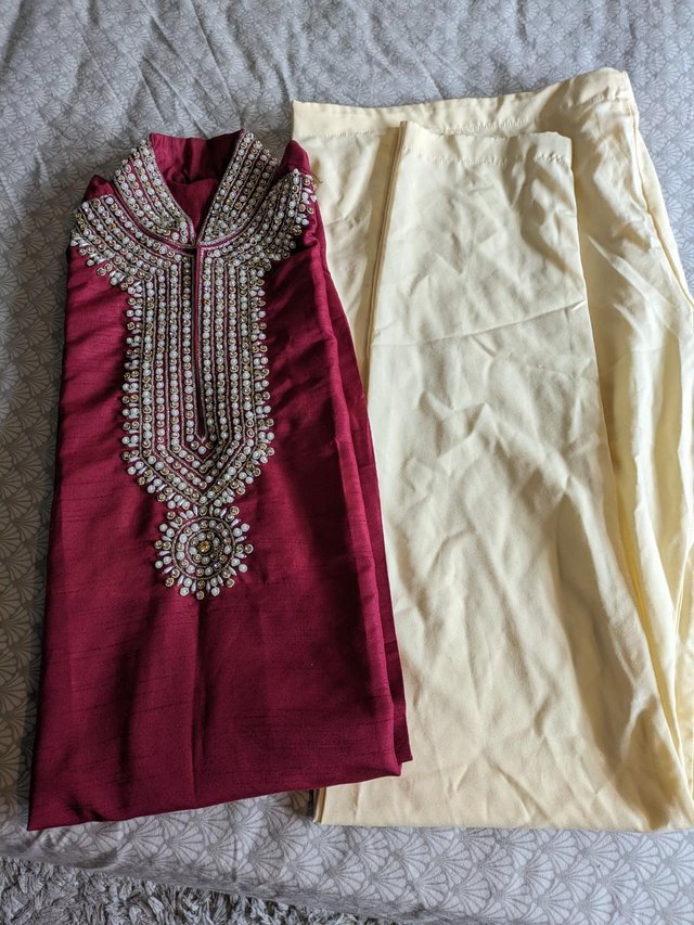 Preview of the first image of Exotic Burgundy Red Wedding Kurta Pyjama.