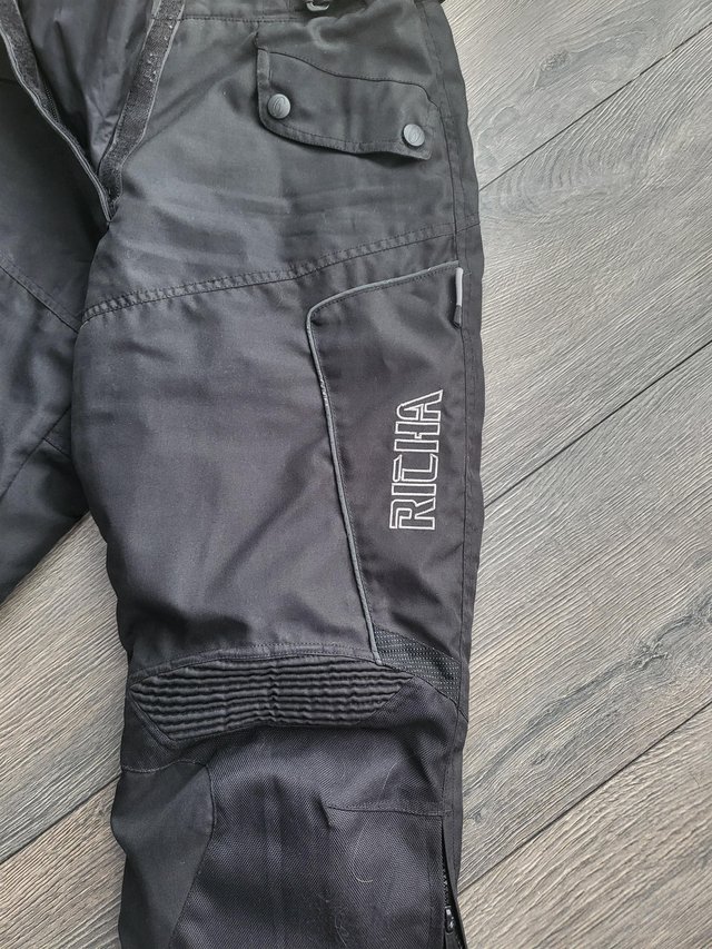 Preview of the first image of Motorbike jacket and pants size 10/12.