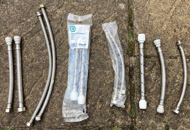 Image 1 of BNIB PLUMBING LOT 15mm TAILS TAP HOSES STEEL BRAIDED PIPE
