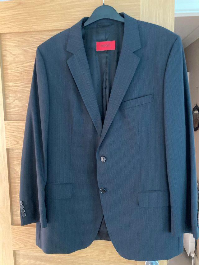 Preview of the first image of Hugo Boss Suit Grey stripe like new.