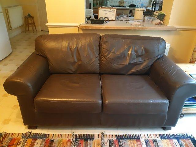 Preview of the first image of IKEA EKTORP Sofa 2 seater brown leather.