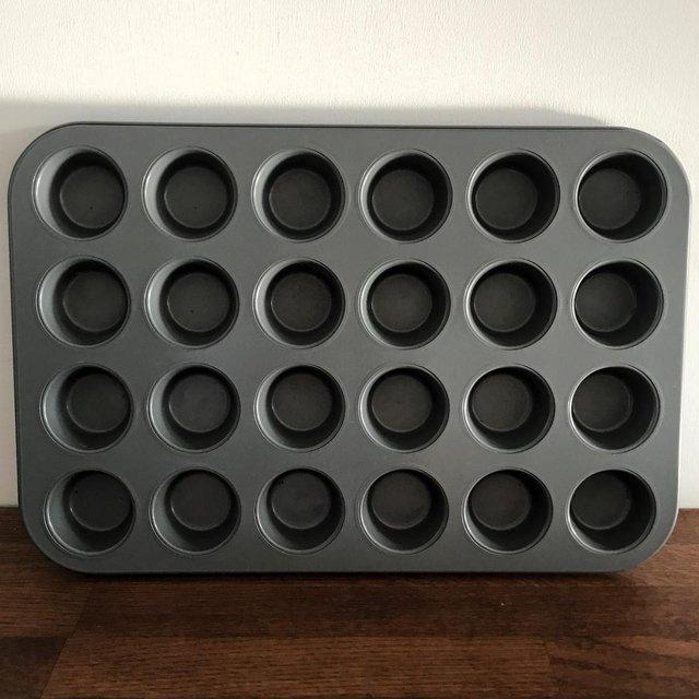 Preview of the first image of 24 hole mini muffin, cup cake, etc. tray. Heavy, non-stick.