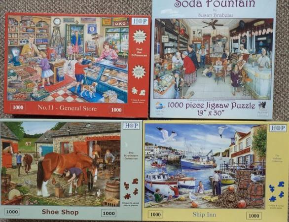 Image 1 of 1000 piece jigsaw puzzles all complete