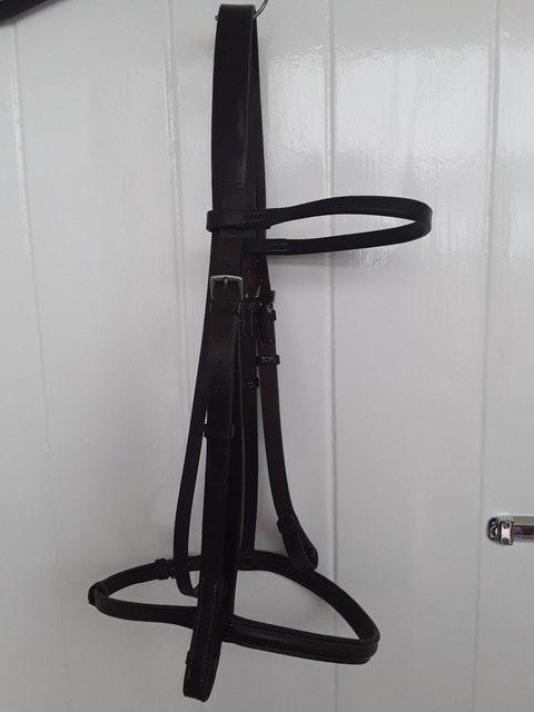 Preview of the first image of BROWN LEATHER COB BRIDLE WITH BROWBAND AND STITCHED NOSEBAND.
