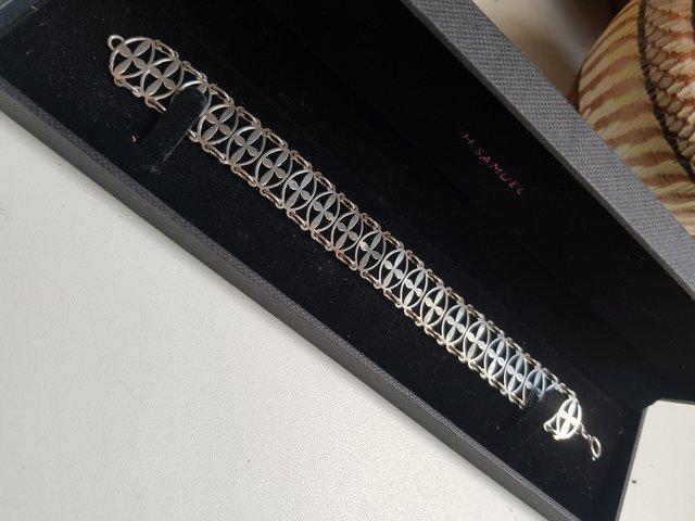 Preview of the first image of Vintage 1970 london unusual sterling silver bracelet boxed.