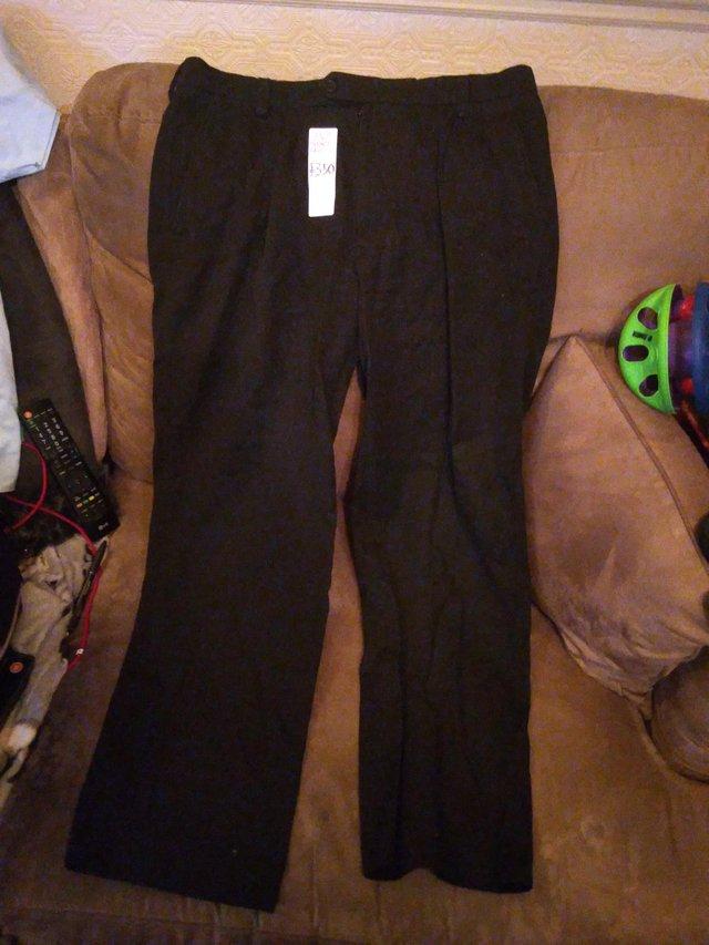 Preview of the first image of Mens Black Work Trousers 34" Waist, Short Leg.
