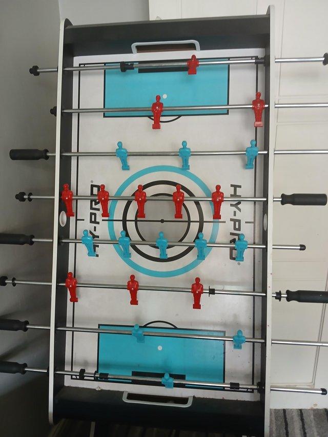 Preview of the first image of Football table with ball.