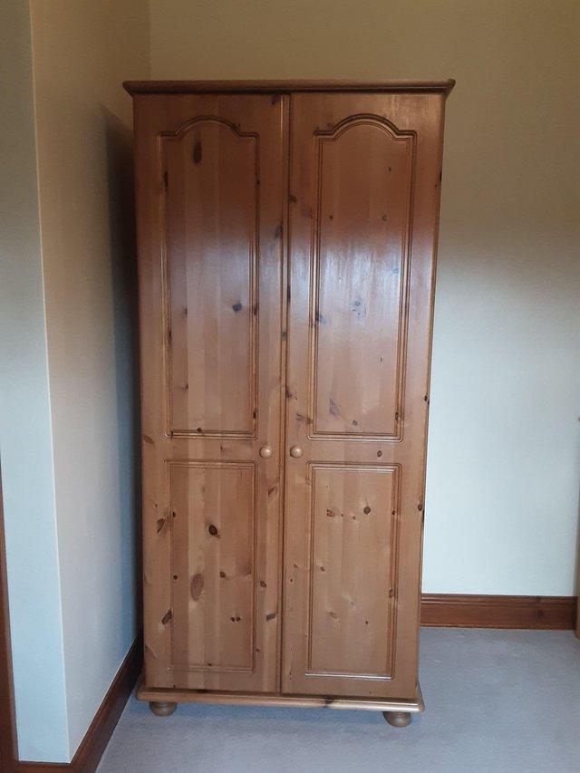 Preview of the first image of Pine wardrobe like new condition.