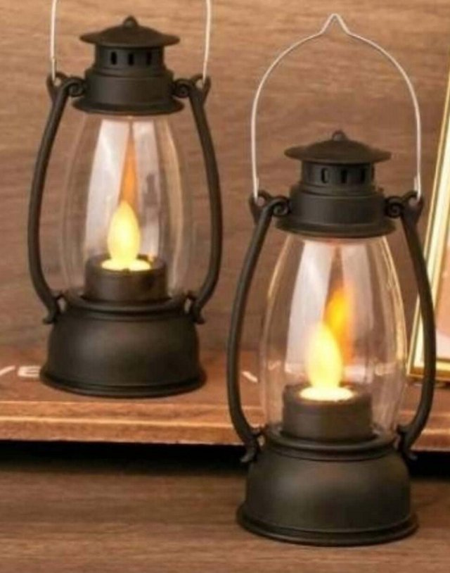 Preview of the first image of 6 black battery lanterns.
