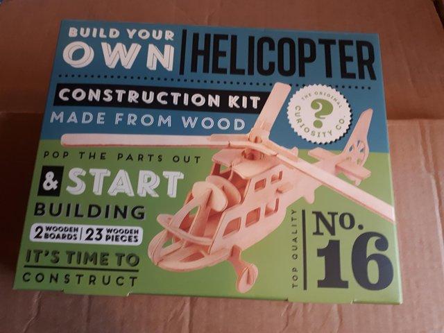 Preview of the first image of Build your own wooden helicopter,   brand new.