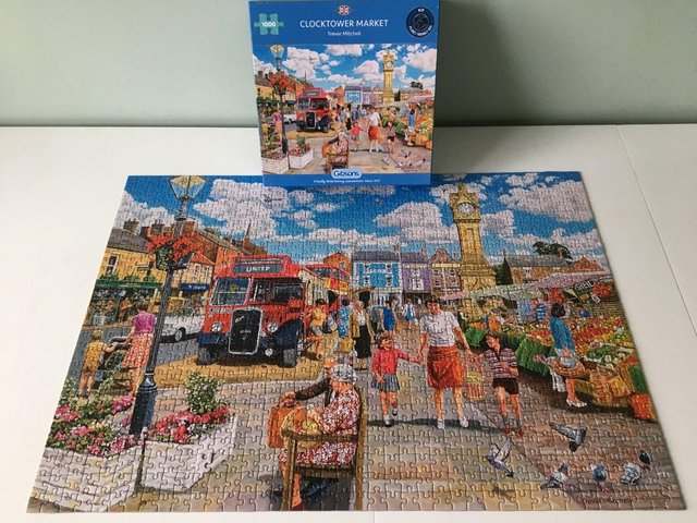 Preview of the first image of Gibson 1000 piece jigsaw titled Clocktower Market..