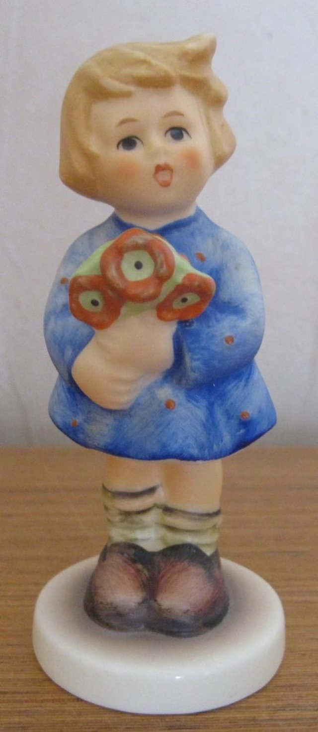 Preview of the first image of Vintage M J Hummel Figure - Girl with nosegay. 9cm tall..