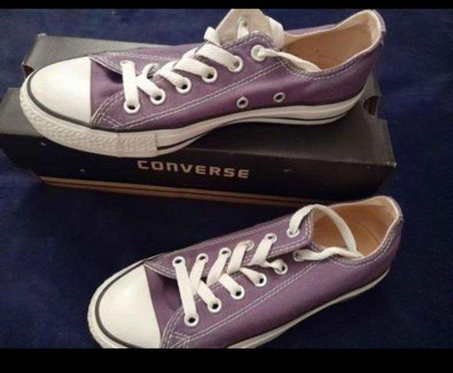 Preview of the first image of Womens Purple Converse (size 5).