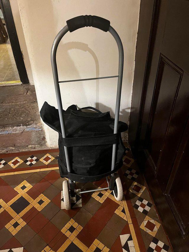 Preview of the first image of Black fabric shopping trolley.