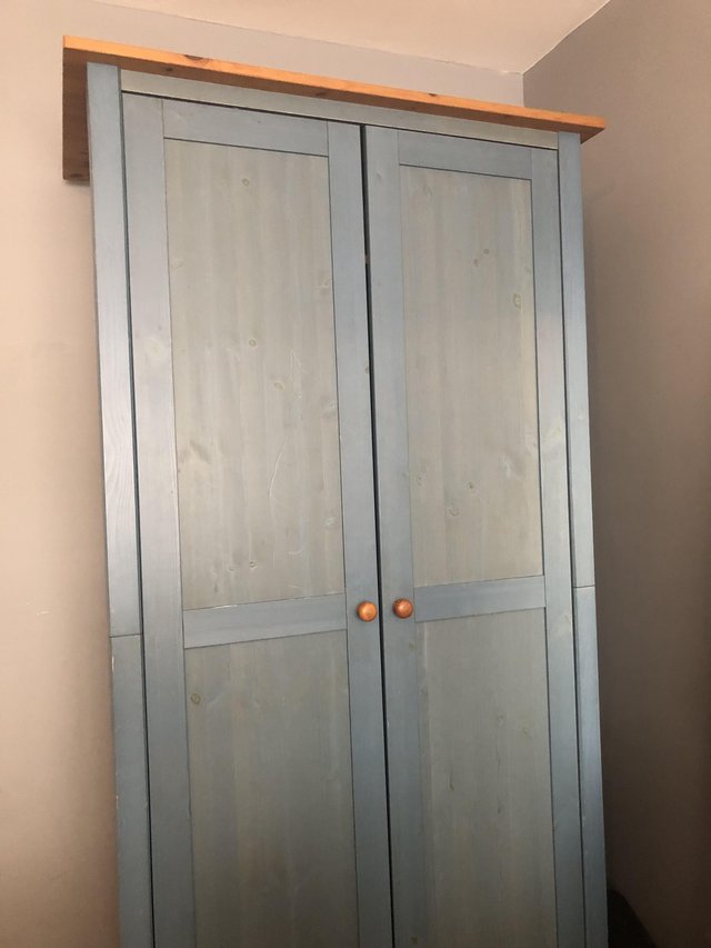 Preview of the first image of Wardrobe in washed blue and wood..