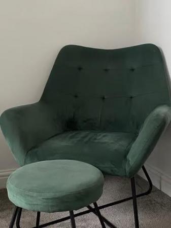 Image 1 of Green accent chair with footstool.