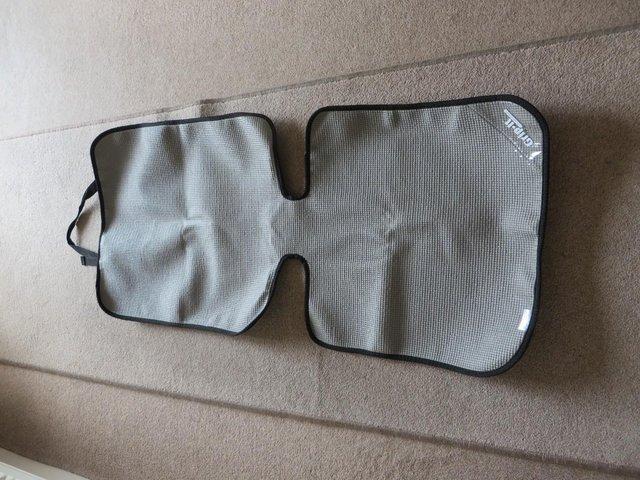 Preview of the first image of Car seat cover for under the baby seat.