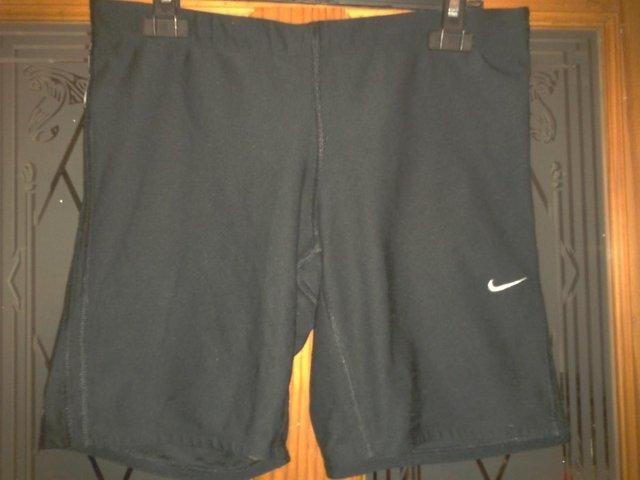 Preview of the first image of Ladies Nike DRI-FIT sports gym yoga shorts   Black Size L.