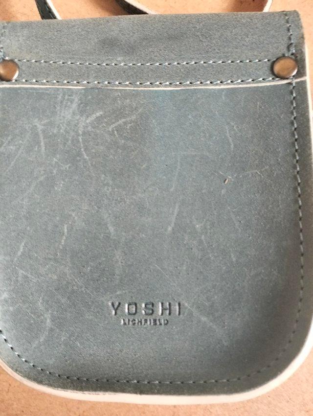 Preview of the first image of Yoshi duck egg blue crossbody leather bag.