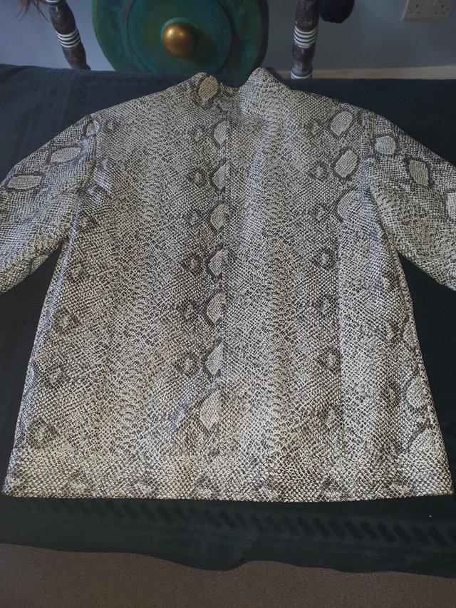 Preview of the first image of Ladies Snakeprint Jacket Size 12.