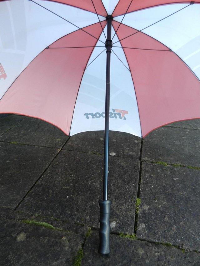 Preview of the first image of RED AND WHITE GOLF UMBRELLA BY TRISPORT.