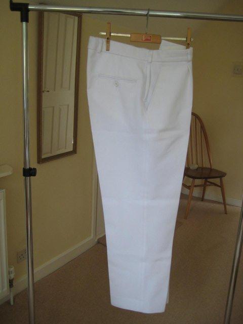 Preview of the first image of White trousers suitable for sport.