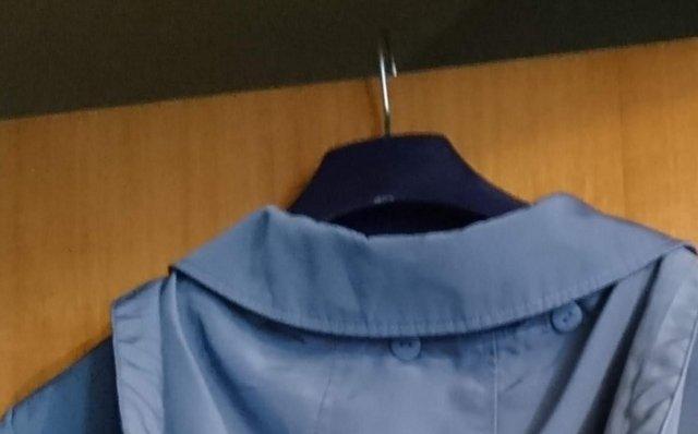 Preview of the first image of Blue Edinburgh Woollen Mill jacket with detachablehood..