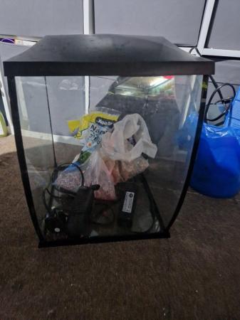 Image 1 of Tropical fish tank with pump and some gravel