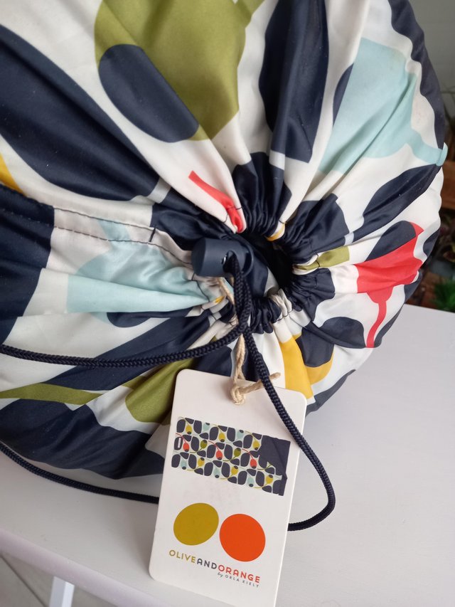 Preview of the first image of ORLA KIELY OLIVE AND ORANGE CAMPING SLEEPING BAG.