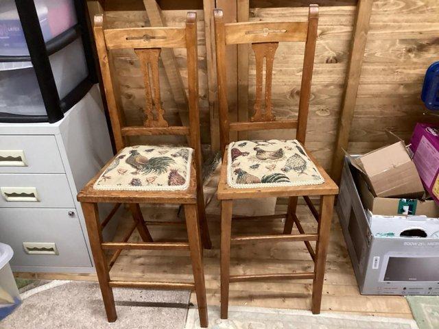 Preview of the first image of Two Edwardian 'correction' chairs.