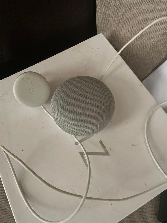 Preview of the first image of Google speaker used but still works in good condition.