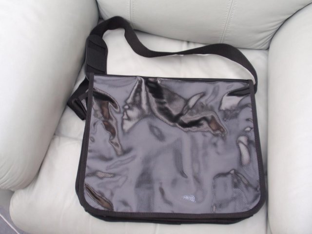 Preview of the first image of Black PVC Laptop / Messenger Bag.