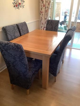 Image 1 of Dinning table and chairs
