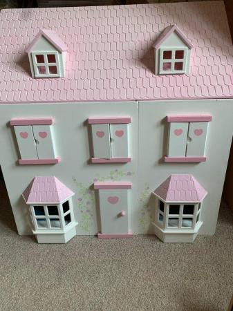 Image 1 of Dolls house (wood and plastic)