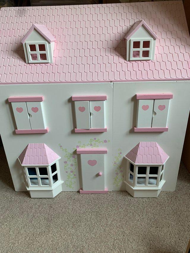 Preview of the first image of Dolls house (wood and plastic).