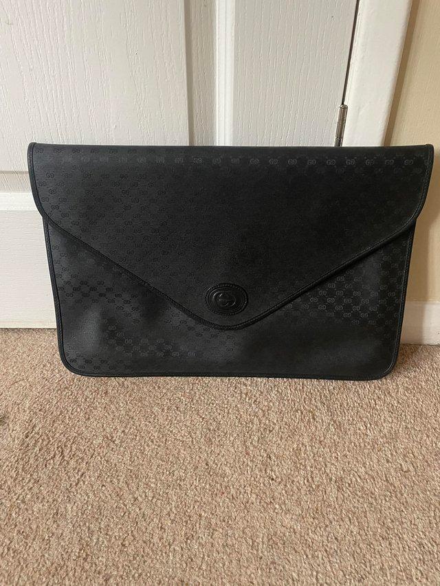 Preview of the first image of Gucci wallet / man bag black leather.