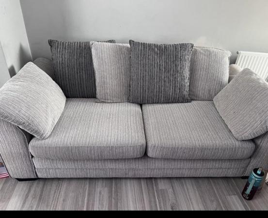 Image 1 of Large 3 seater sofa and matching foot stool