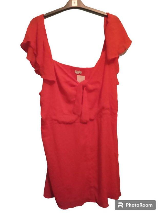 Preview of the first image of Dobby Skater Dress Coral 30 Plus.