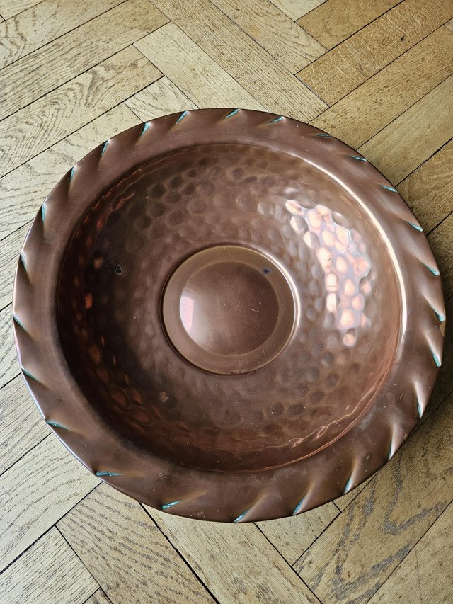 Preview of the first image of Copper decorative dish has previously been wall mounted.