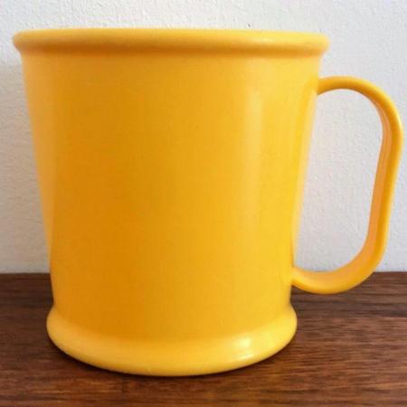 Image 2 of 3 vintage child's plastic mugs-dragon design, yellow, orange