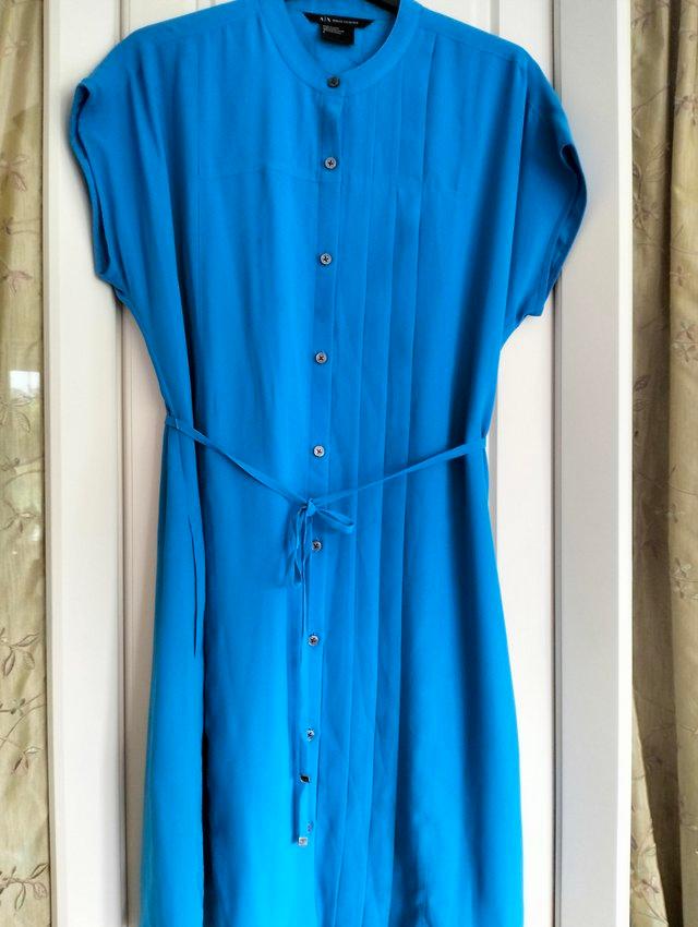 Preview of the first image of Armani Knee length turquoise dress.