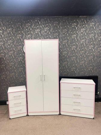 Image 1 of NOVA WHITE SET WITH PINK TRIM WARDROBE CHEST AND BEDSIDE