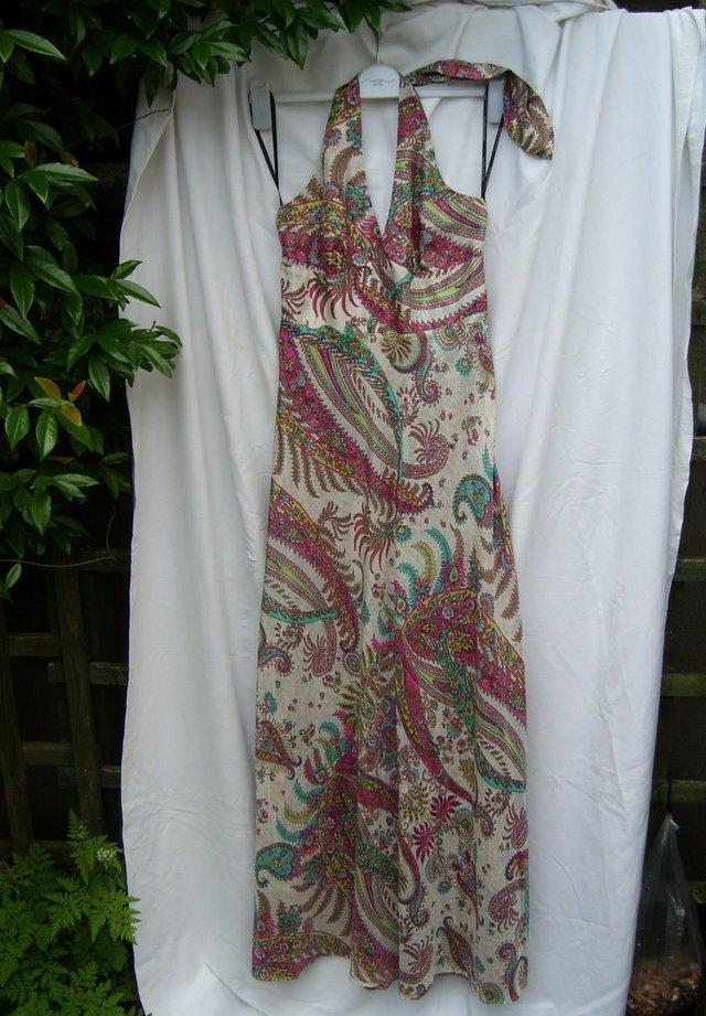 Preview of the first image of WAREHOUSE 100% Silk Maxi Halter Dress–Size 10.