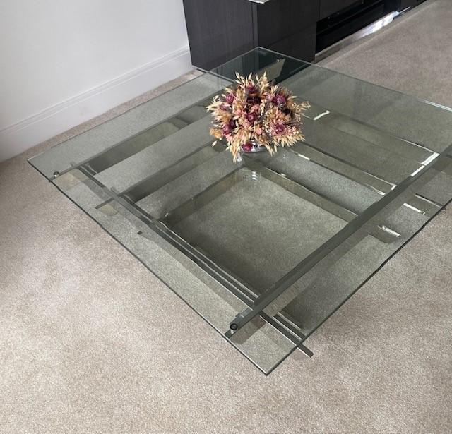 Preview of the first image of Toughened Glass & Polished Metal Coffee Table.