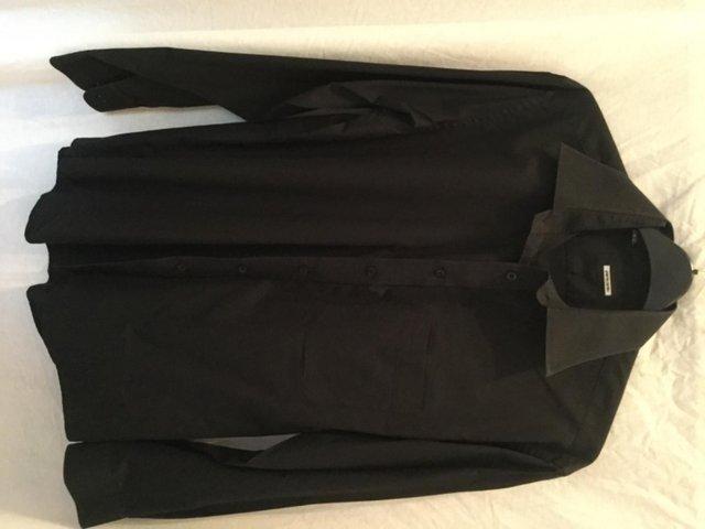 Preview of the first image of Classic black shirt by Pierre Cardin.