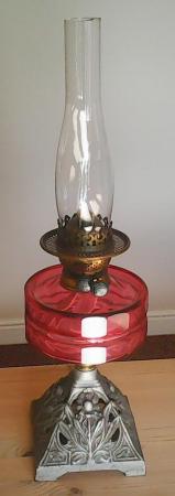 Image 2 of Vintage oil lamp with 'cranberry' coloured glass reservoir