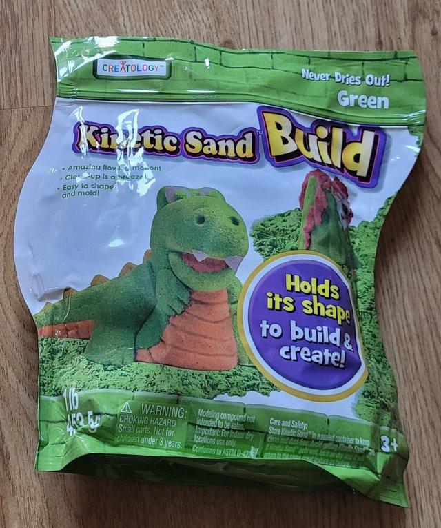 Preview of the first image of Kinetic Sand - Mouldable Sensory Play Sand, Green.