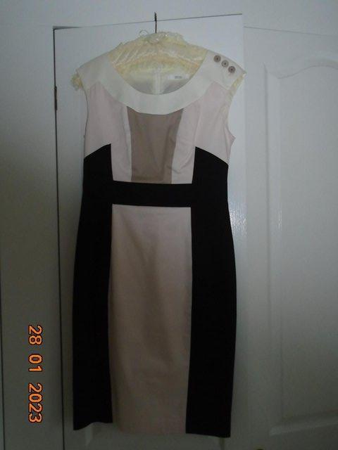Preview of the first image of Pale pink, off-white, mink and black sleeveless cotton dress.