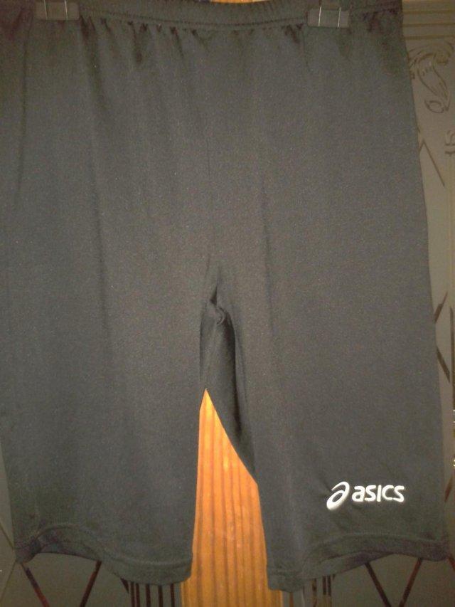 Preview of the first image of Ladies Asics sports gym yoga shorts   Black Size XL.